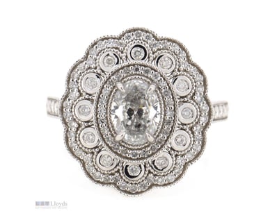 14K WHITE GOLD AND DIAMOND, CLUSTER RING.      

T...