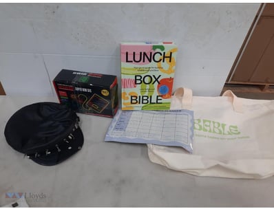 Assorted Lot Including hat, book, game and more.

...