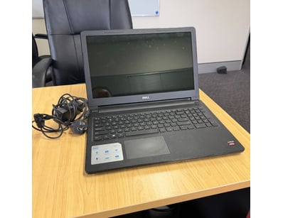 Dell Inspiron 15 3000 Series laptop featuring a 15...