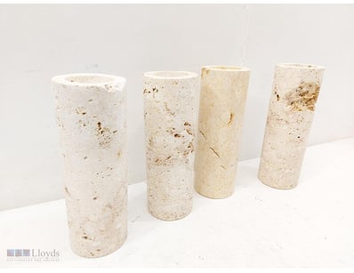 Set of four cylindrical travertine or composite st...