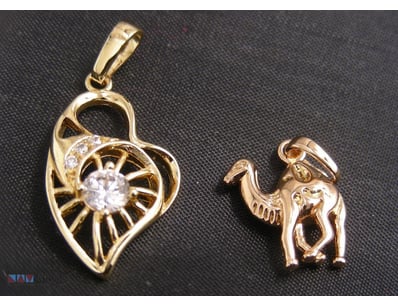 GOLD COLOUR PENDANTS        

Condition: Good - Re...