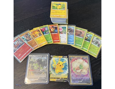 ASSORTED BULK POKÉMON CARDS INCLUDING HOLOS, V & M...