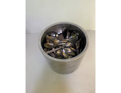 Lot of teaspoons with metal cutlery bucket. 

SOLD...