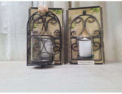 Set of two decorative lamps featuring ornate scrol...