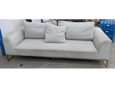 Modern contemporary sofa featuring a light grey li...