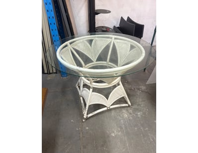 Vintage rattan and glass pedestal table featuring ...