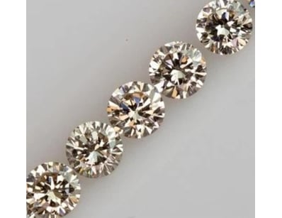0.09 CARAT LIGHT BROWN 5 ROUND DIAMOND         

C...