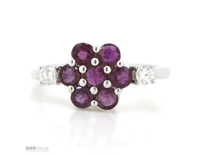 14K WHITE GOLD, RUBY AND DIAMOND, FLORAL RING.    ...