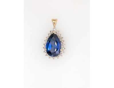 9CT SYNTHETIC SPINEL AND DIAMOND PENDANT


5830...