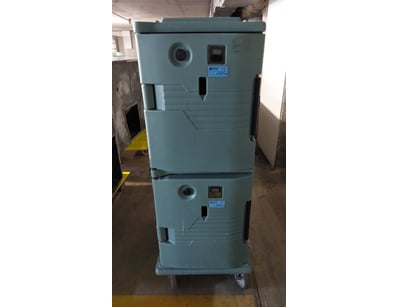 Stacked pair of National brand insulated food tran...