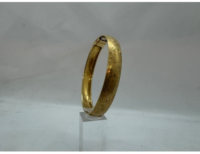 14K GOLD BANGLE

6Cm X 4.5
15G

Dimensions: He...