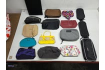13 · An assortment of stylish carry bags. Sold as lot.