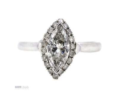 14K WHITE GOLD AND DIAMOND, HALO RING.      

The ...