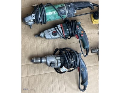 Assorted 240V power tools. 1 x Hikoki G 23UDY2 ang...