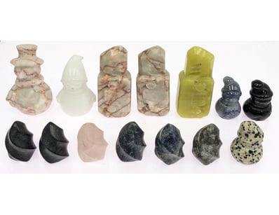 COLLECTION OF CARVED STONE FIGURINES AND ORNAMENTA...