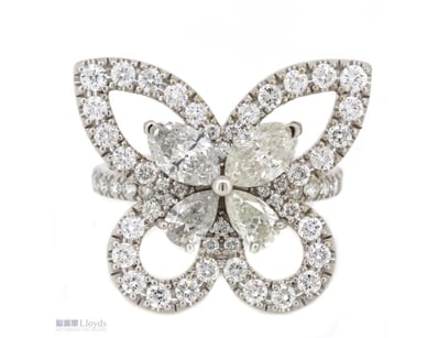 14K WHITE GOLD AND DIAMOND, BUTTERFLY RING.      
...