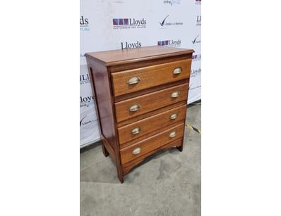 Vintage timber chest of drawers featuring four spa...