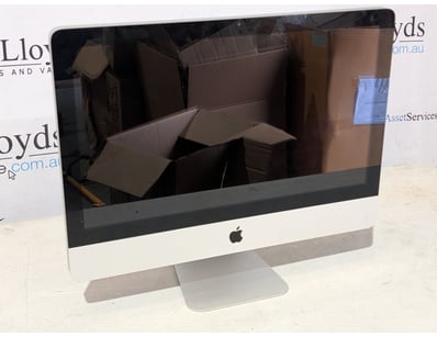 Apple iMac all-in-one desktop computer featuring a...