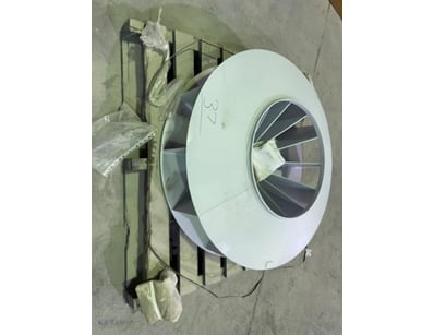 Unused fan impeller assembly featuring a white com...