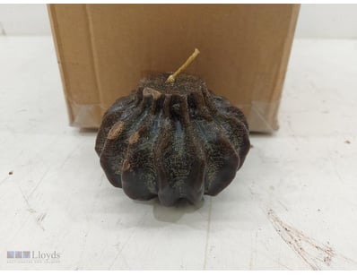 Lot comprising dark brown sculptural candles with ...