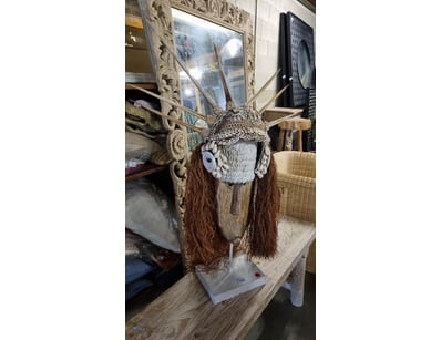 Striking decorative tribal mask sculpture featurin...