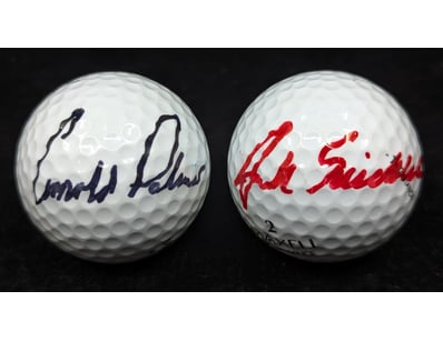 TWO SIGNED GOLF BALLS INCLUDING ARNOLD PALMER

C...