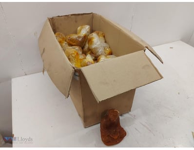 Lot comprising multiple amber Wax Candle Buddha fi...