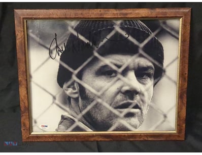 THIS FRAMED IMAGE FEATURES A BLACK AND WHITE PHOTO...