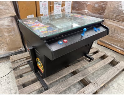 Arcade cocktail table featuring dual-screen displa...
