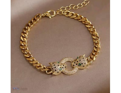 GOLD STAINLESS STEEL LIONS HEAD BRACELET WITH ZIRC...