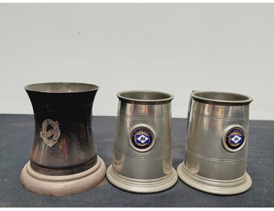THREE VINTAGE GERMAN BEER STEINS WITH CERAMIC BASE...