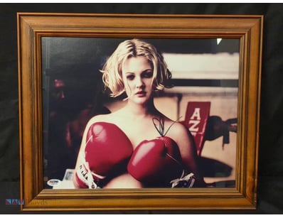 AUTOGRAPHED PHOTOGRAPH OF DREW BARRIMORE.

Item Si...