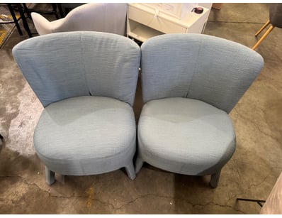Pair of contemporary upholstered accent chairs fea...