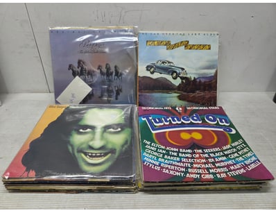 Vinyl records, spanning multiple genres and decade...
