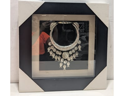 Exquisite silver statement necklace featuring an o...