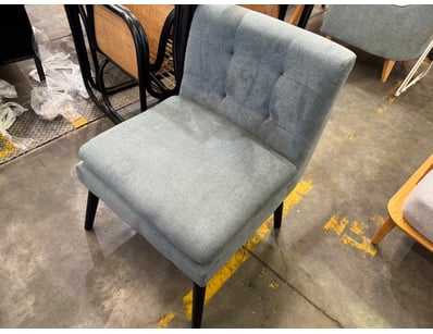 Modern dining chair featuring a grey upholstered s...