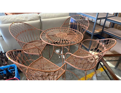 Brass coloured metal style table with four chairs....