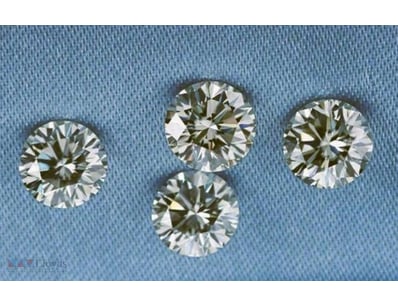 0.10 CARAT BROWN 4 ROUND DIAMOND         

Conditi...