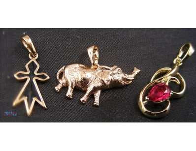 GOLD COLOUR PENDANTS        

Condition: Good - Re...