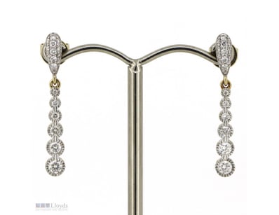 14K YELLOW GOLD AND DIAMOND, DROP EARRINGS.      
...