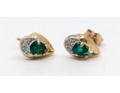 9k yellow gold stud earrings, earrings feature whi...