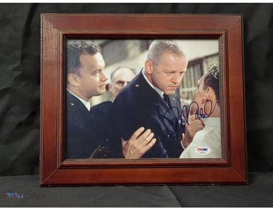 A FRAMED PHOTOGRAPH FEATURING ACTORS FROM THE 1999...