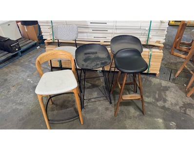 Lot of four modern bar stools featuring mixed mate...