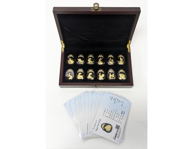 SET OF TWELVE GOLD INLAID JADE PENDANTS WITH CERTI...
