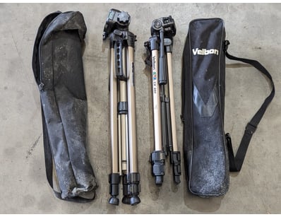 Two camera tripods in carry cases,
Zip on one bag ...