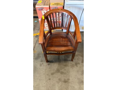 Timber style barrel chair featuring a distinctive ...