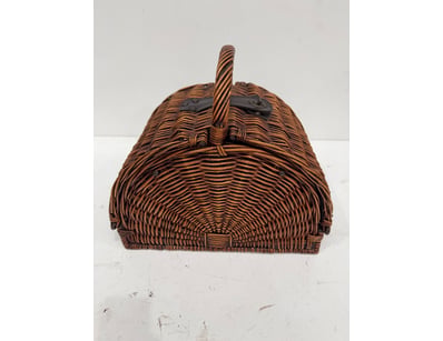 Pair of wicker picnic baskets comprising one dark ...