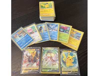 ASSORTED BULK POKÉMON CARDS INCLUDING HOLOS, V & M...