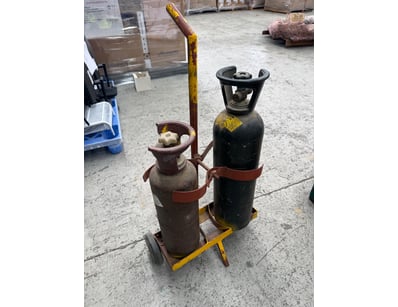 Industrial gas cylinder trolley featuring two weld...