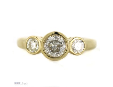 14K YELLOW GOLD AND DIAMOND, TRILOGY RING.      

...